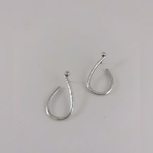 Simple silver colored curve earrings
